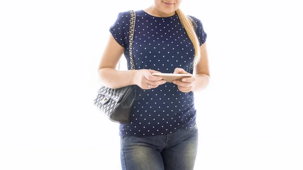 Closeup isolated image of young woman holding smartphone — Stock Photo, Image