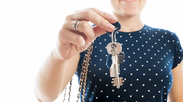 Isolated closeup photo of young woman with keys from new house — Stock Photo, Image