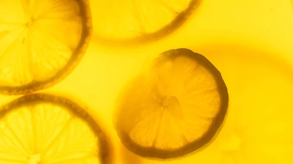 Imagen abstracta de primer plano de rodajas de naranja y limón recién cortadas — Foto de Stock