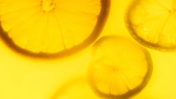 Detailní snímek siluety čerstvě nakrájené otanges a citrony — Stock fotografie
