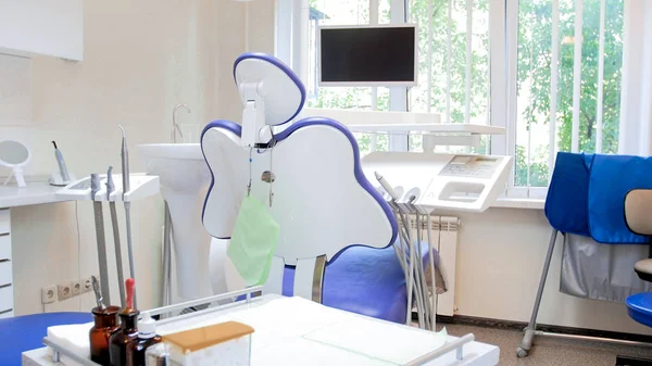 Rear view image of empty dentist chair in modern clinic — Stock Photo, Image