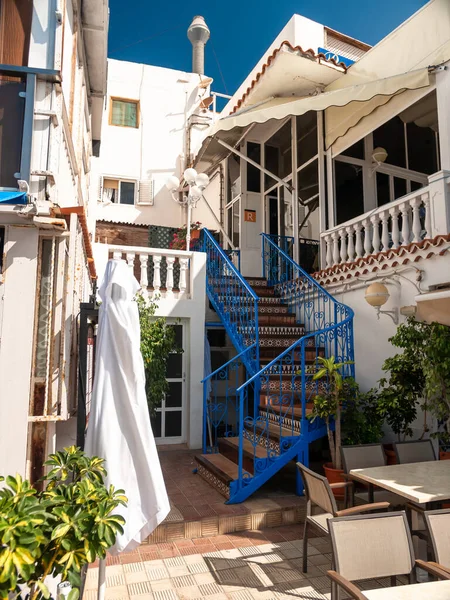 Beautiful image of blue metail stairs going in the seaside house inner court — Stock Photo, Image