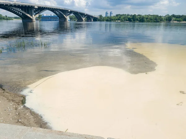 Image of pouring toxic waste from afctory in the river