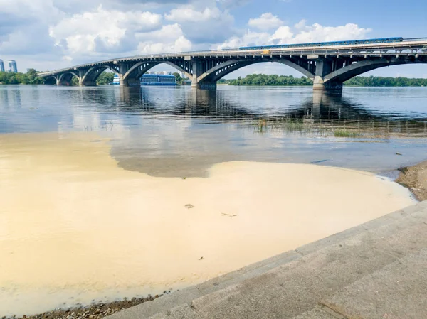Photo of river Dnipro being polluted by toxic wastes in Kiev, Ukraine
