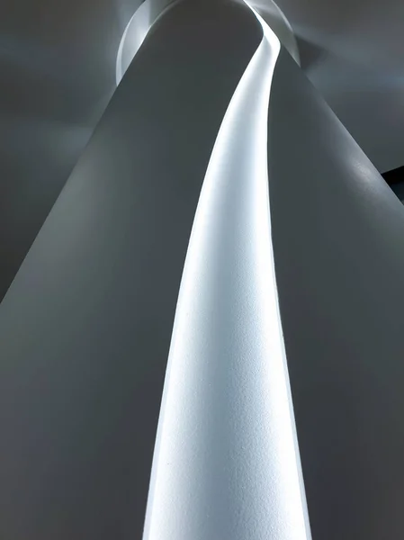 Abstract architecture image of curved illuminated column — Stock Photo, Image