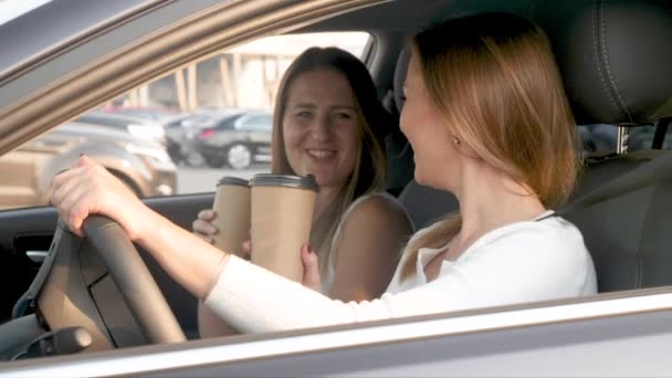 4k video of two female friends got in car accident because they were distracted by talks while driving — Stock Video