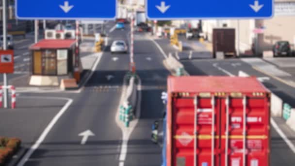 4k out of focus blurrred video of delivery cargo trucks riding on big busy highway. Perfect background or backdrop for trasportation, logistics or cargo shot. — Αρχείο Βίντεο
