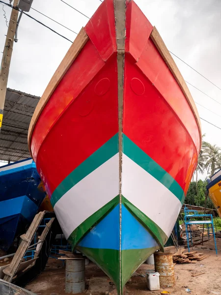 Closeup image of beautiful colorful painted fishing boat nose in docks at port — Stock Photo, Image