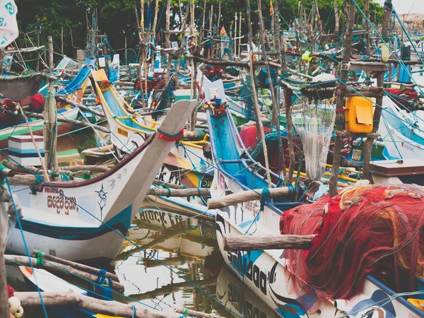 Closeup photo of old traditional poor wooden boats for fishing in ocean harbor at Sri Lanka — Stock Photo, Image