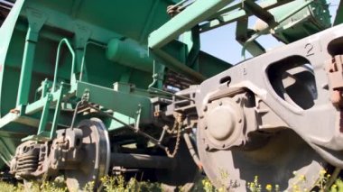 4k dolly video of long cargo train with big train cars. Concept of transportation and cargo using railways
