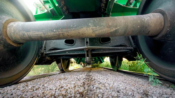 View from the ground on big metal train axxle on railroad — Stock Photo, Image