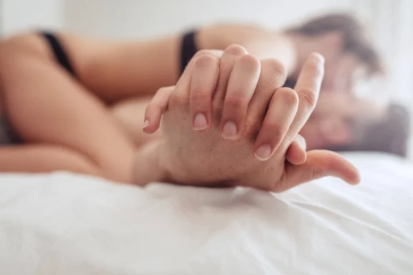 Close up view on hands of young couple — Stock Photo, Image
