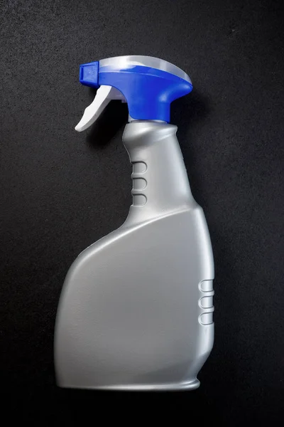 Hushållstvätt Produkt Behållare Ett Svart Bord — Stockfoto