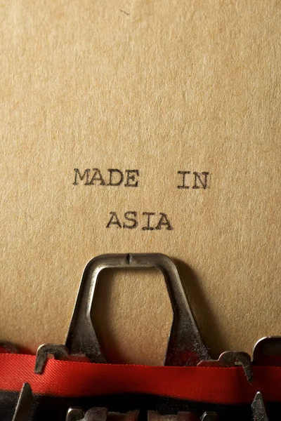 Frase Hecho Asia Escrito Con Una Máquina Escribir —  Fotos de Stock