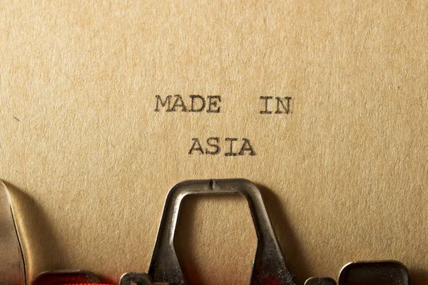 Frase Hecho Asia Escrito Con Una Máquina Escribir —  Fotos de Stock