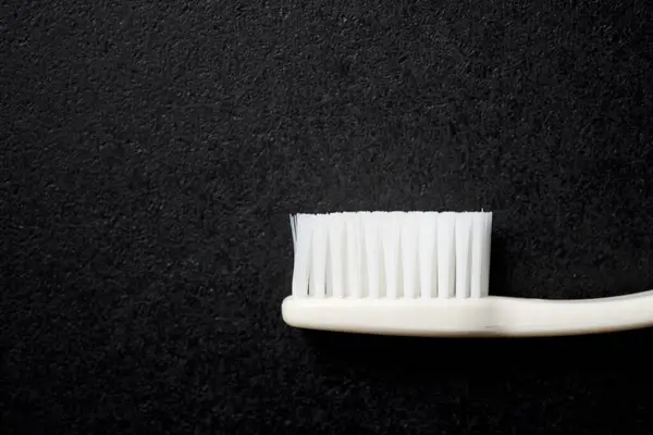 Οδοντόβουρτσα Μαύρο Τραπέζι — Φωτογραφία Αρχείου