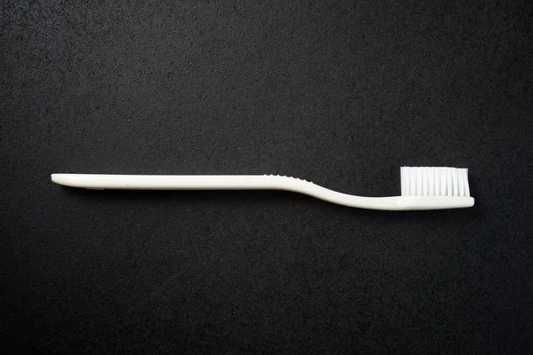 Escova Dentes Uma Mesa Preta — Fotografia de Stock