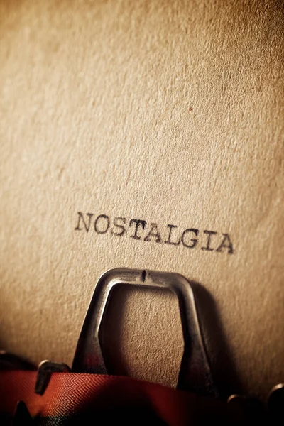 Palavra Nostalgia Escrita Com Uma Máquina Escrever — Fotografia de Stock