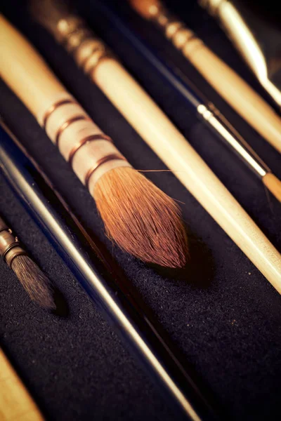 Paintbrushes Black Table — Stock Photo, Image