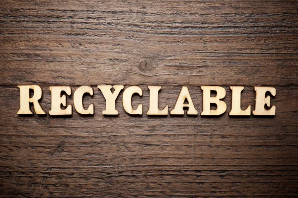 Recyclingfähiges Wort Auf Einem Holztisch — Stockfoto
