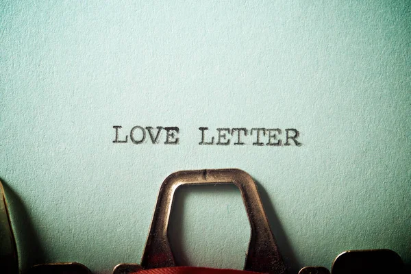Love letter text written on a paper.