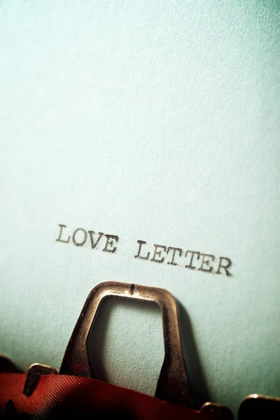 Love letter text written on a paper.