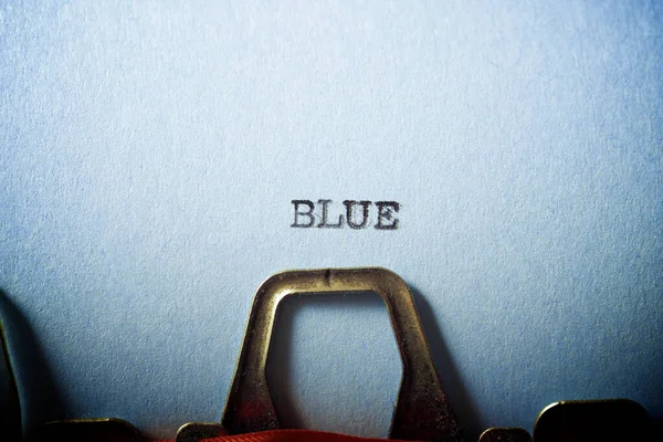 Blaues Wort Auf Papier Geschrieben — Stockfoto