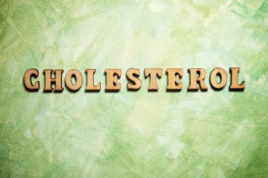 Yeşil kağıtta kolesterol kelimesi.