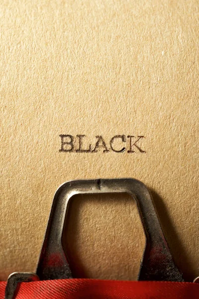 Black word written on a paper.