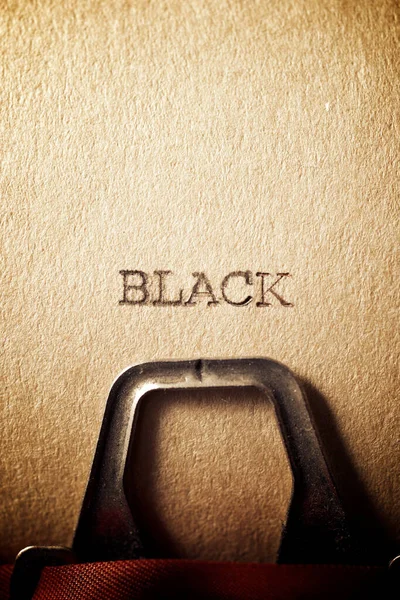 Schwarzes Wort Auf Papier Geschrieben — Stockfoto