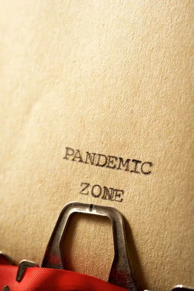 Pandemic zone text written on a paper.