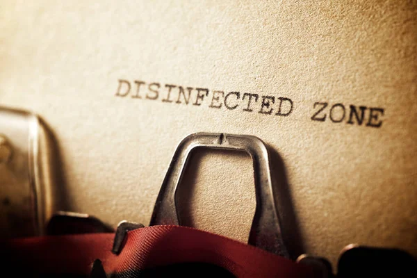 Disinfected zone text written on a paper.