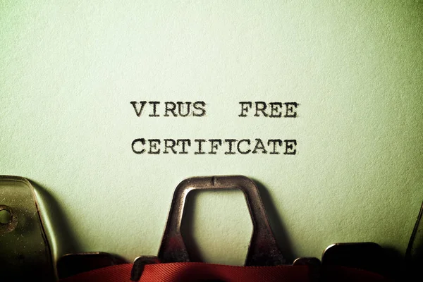 Virus free certificate text written with a typewriter.