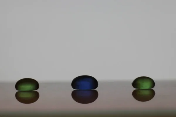 3 유리 돌, 녹색 및 파랑 돌, 조화 스톡 사진