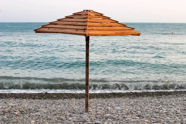 Umbrella on the beach, wooden umbrella — Stock Photo, Image
