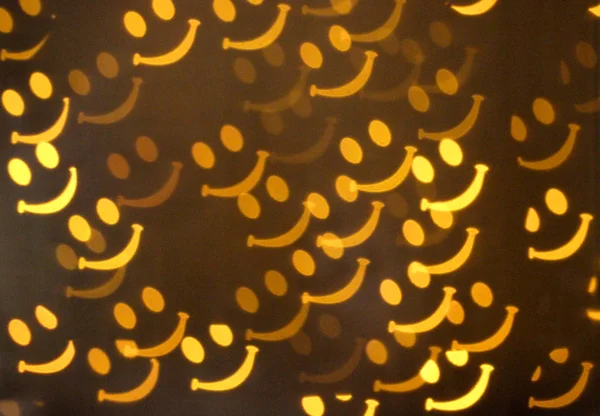 glowing smiles, smiley, emoticon, yellow smiley face, funny smile on a black background