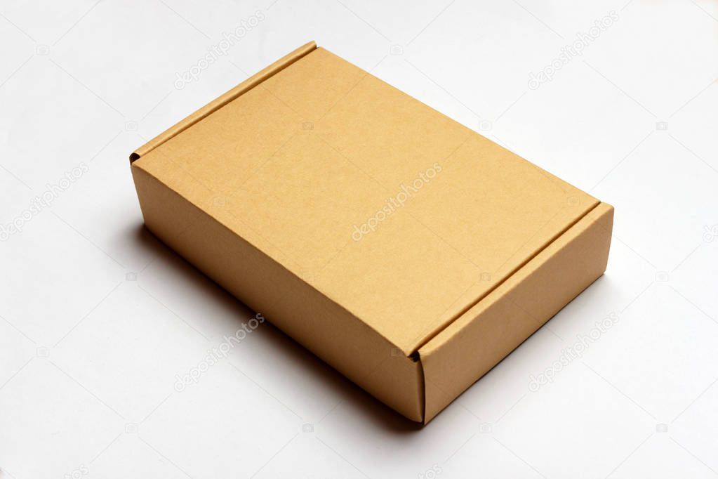 Closed cardboard box isolated on a white