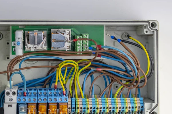 Panel board. the wires are communicated with terminals for connecting to the machine and controlling the houses — Stock Photo, Image