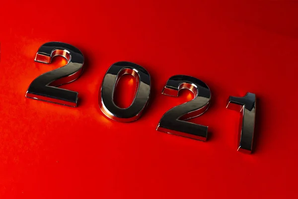 Orange background. close-up. the laid out numbers 2021. metallic luster. — Stock Photo, Image