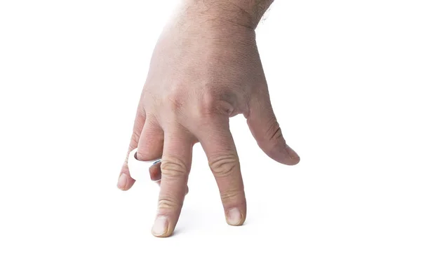 The human hand on the ring finger is dressed like a wedding ring. Close-up. Isolated on a white background — Stock Photo, Image