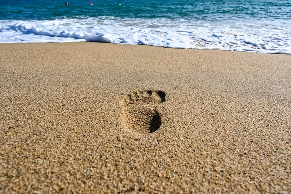 foot print on a sandy beach in Spain