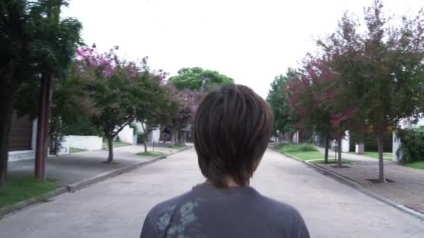 Boy Walking Middle Street — Stock Video