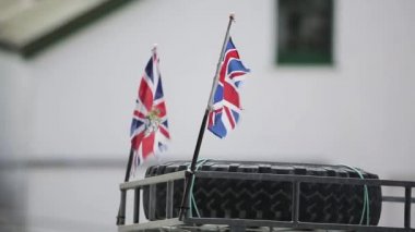 Port Stanley Pride: Union Jack-Covered Car on the Falklands