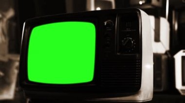 Vintage Tv yeşil ekran ile. Sepya atış. Vınlamak dışarı. Herhangi bir görüntü veya resim ile yeşil ekran değiştirmek hazır istiyorum.