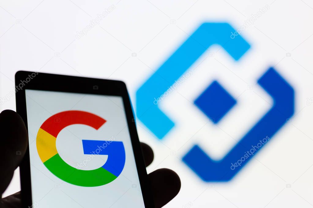 MOSCOW, RUSSIA - MAY 9, 2018: Smartphone in hand with Google logo. Roskomnadzor (RKN) emblem on background. Millions of IP was blocked to ban Telegram app messenger. Censorship. VPN. Proxy. Freedom.