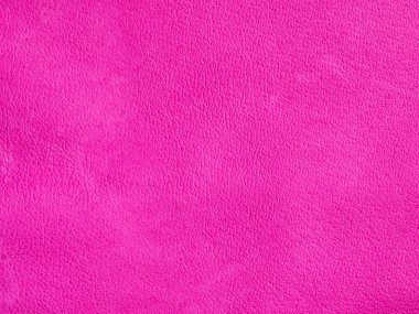 Deri desenli bir arka plan. Pembe, bronzlaşmış dana derisi boyalı ve fuşin boyasıyla işlenmiş. Bir sürü detay, makro mercekli önden çekim. Kenarlık veya çerçeve için kopyalama alanı