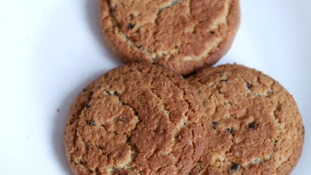 Oatmeal Cookies Lie White Plate Male Hand Takes Sweet Ruddy — Stock Video