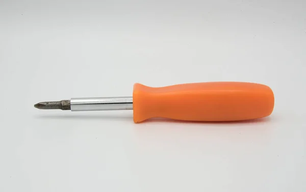 Orange screwdriver — Stock Photo, Image