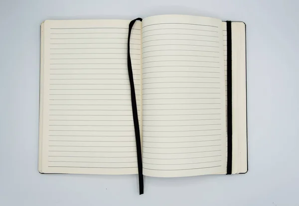 Cuaderno sobre un fondo blanco —  Fotos de Stock