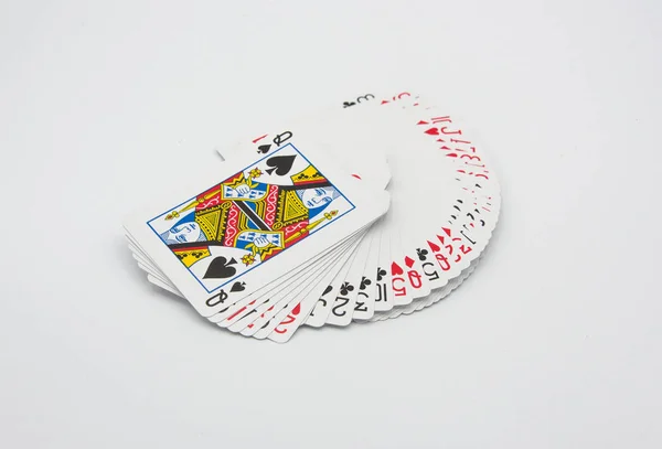 Jogando cartas em um fundo branco — Fotografia de Stock